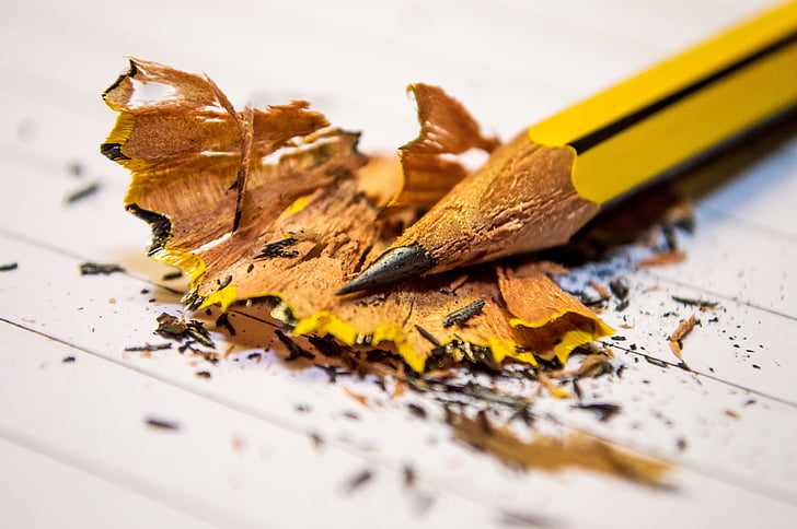 close-up, macro, messy, pencil, pencil shavings, yellow, studio shot